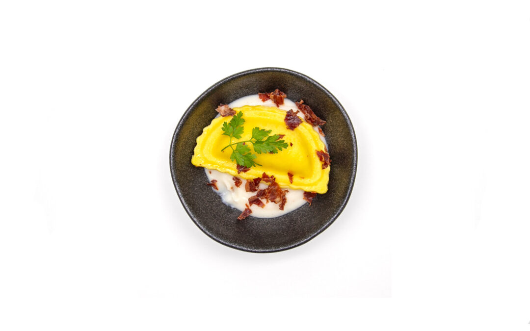 Mezzaluna Quattro Formaggi à la sauce crémeuse au parmesan