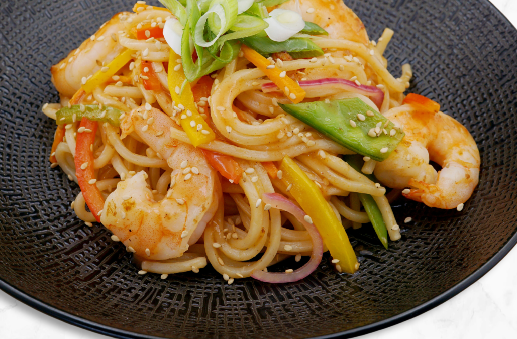 Nouilles sautées aux scampis sauce aigre-douce